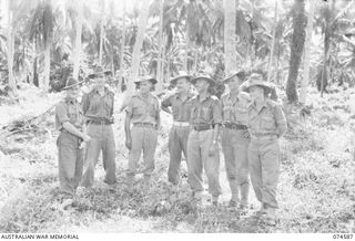 NAGADA, NEW GUINEA. 1944-07-09. OFFICERS OF THE 15TH FIELD COMPANY, WHO ARE IN CHARGE OF THE RECONSTRUCTION OF THE MADANG-ALEXISHAFEN ROAD. IDENTIFIED PERSONNEL ARE:- VX132621 LIEUTENANT F.G. ..