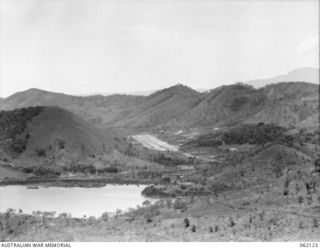 PORT MORESBY AREA, NEW GUINEA. 1943-12-29. KILA AERODROME FROM THE TUA-GUBA HILL, WITH STOKES RANGE IN THE BACKGROUND