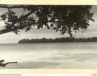 SIKI COVE, FINSCHHAFEN AREA, NEW GUINEA. 1944-03-21. A SECTION OF THE PANORAMA VIEWED FROM THE NORTH END OF SCARLET BEACH PICTURING SIKI COVE IN THE DISTANCE. THE SCENE IS WITHIN THE AREA OF ..