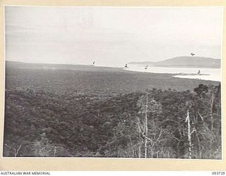 WEWAK AREA, NEW GUINEA, 1945-06-29. THE COAST SEEN FROM MOUNT SHIBURANGU SHOWING BOIKEN POINT (1), CAPE PUS (2), CAPE WOM (3), KAIRIRU ISLAND (4) AND MUSEHU ISLAND ISLAND (5). MOUNT SHIBURANGU WAS ..