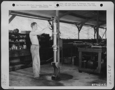 This tester for fighter struts was built by the hydraulic department of the 27th Air Depot Group at the Port Moresby Air Depot, Papua, New Guinea. 1943. (U.S. Air Force Number 67702AC)