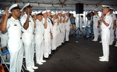 US Navy (USN) Vice Admiral (VADM) Barry Costello (foreground right), Commander, USN 3rd Fleet presides over a Re-enlistment Ceremony held aboard the USS MISSOURI (BB 63) Memorial at Navy Base (NB) Pearl Harbor, Hawaii (HI). The Ceremony is being held to coincide with the Nation's 230th Birthday