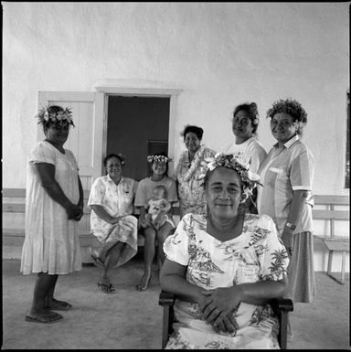 Tokerau Munro and a group of women frame 7