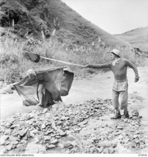 ZENAG, NEW GUINEA, 1944-02-27. PRESENTATION OF BURLESQUE ON BUTTERFLY HUNTING (A POPULAR PASTIME WITH TROOPS IN NEW GUINEA), BY MEMBERS OF THE 2/9TH FIELD COMPANY, ROYAL AUSTRALIAN ENGINEERS, ..