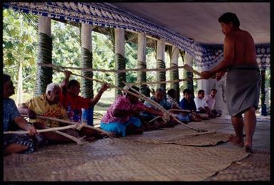 Conferring of Matai Ariki titles, Sāmoa. Presentation of 'ava roots