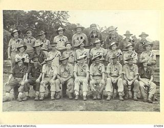 LAE, NEW GUINEA. 1944-08-03. PERSONNEL OF THE 2ND CORPS SALVAGE UNIT. IDENTIFIED PERSONNEL ARE:- NX103951 PRIVATE J.D. ROCHFORD (1); NX141035 LANCE CORPORAL C. MANWARING (2); NX119892 LANCE ..