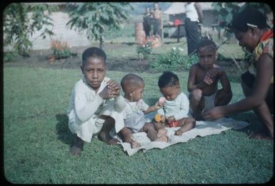 Children of dokta bois includes babies, Basil on left, Johannes on right : Minj Station, Wahgi Valley, Papua New Guinea, 1954 / Terence and Margaret Spencer
