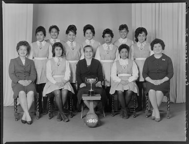 Cook Islands basketball team with trophy