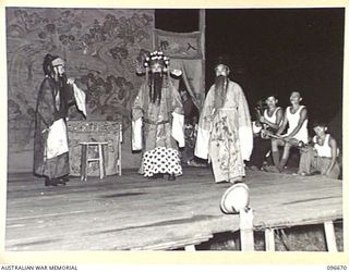 LAE, NEW GUINEA. 1945-09-09. A SCENE DURING A PERFORMANCE BY A FORMOSAN CONCERT PARTY AT A PRISONER OF WAR CAMP