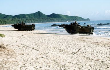 United States Marine Corps amphibious assault vehicles from the 15th Marine Expeditionary Unit of Camp Pendleton "invade" the shores of Bellows Air Force Station in Hawaii. The vehicles were disembarked by the USS BOXER Amphibious Ready Group as part of a training exercise enroute to a six-month tour in the Western Pacific. Bellows AFS is primarily used as a recreation site for military personnel, but is ideal and often used for amphibious training