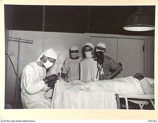 PALMALMAL PLANTATION, JACQUINOT BAY, NEW BRITAIN, 1945-08-14. A SURGICAL OPERATION IN PROGRESS IN THE THEATRE OF THE 600 BED 2/8TH GENERAL HOSPITAL