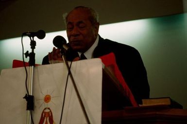 King Taufa'ahau Tupou IV speaking from the pulpit at the dedication of Vaine Mo'onia (The True Vine) church