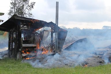 Close u of lava burning a shed near Pahoa, Hawaii resulting from Kilauea Volcano eruption and lava flow of 2014.