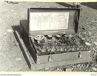 LAE AREA, NEW GUINEA. 1944-11-27. THE DISTRIBUTOR BOARD OF A CAPTURED JAPANESE AIRCRAFT PREDICTOR IN THE MUSEUM OF THE ASSISTANT QUARTERMASTER GENERAL (E), 1ST AUSTRALIAN ARMY