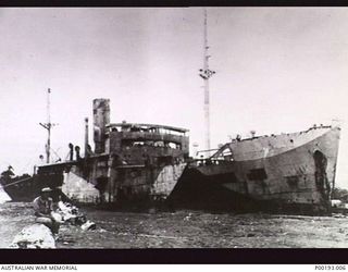 MALAHANG, NEW GUINEA, C. 1945. WRECKAGE OF JAPANESE SHIP THE MYOKO MARU, NEAR LAE