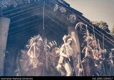 Ceremonial dress, group of men