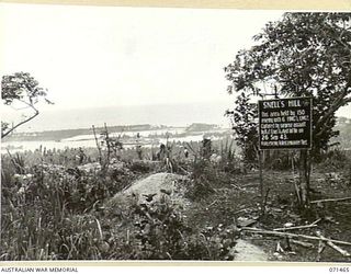 SNELL'S HILL, FINSCHHAFEN AREA, NEW GUINEA. 1944-03-27. THE BATTLE SIGN ON SNELL'S HILL RECORDING THE ACTIVITIES OF B AND C COMPANIES, 2/15TH INFANTRY BATTALION ON THE 1943-09-26, DURING OPERATIONS ..