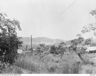 PORT MORESBY, NEW GUINEA. 1943-12-17. LOOKING UP THE FOUR MILE VALLEY FROM HEADQUARTERS, NEW GUINEA FORCE, SHOWING THE MURRAY BARRACKS AREA IN THE CENTRE OF THE PICTURE