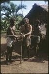 Setting up cross-stick from which to hang shell money from for a bride price