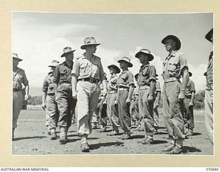 LAE, NEW GUINEA. 1944-11-11. VX104013 MAJOR I.A. WILSON, COMMANDING OFFICER (1), INSPECTING NO. 2 PLATOON, DURING A UNIT PARADE OF PATIENTS AND PERSONNEL OF THE 112TH CONVALESCENT DEPOT. IDENTIFIED ..