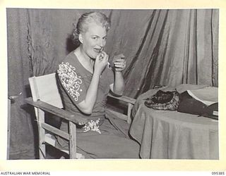 TOROKINA, BOUGAINVILLE, 1945-08-16. GRACIE FIELDS IN HER DRESSING ROOM MAKING UP BEFORE HER APPEARANCE DURING A CONCERT TOUR ENTERTAINING TROOPS AT HEADQUARTERS 2 CORPS