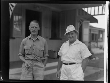 Two unidentified men outside Northern Hotels, Rakiraki, Fiji