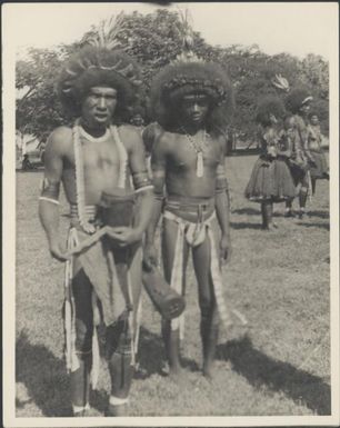 Several Motuan male dancers with hand drums, Port Moresby, Papua, ca. 1923 / Sarah Chinnery