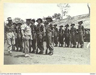 AITAPE, NEW GUINEA. 1945-03-19. GENERAL SIR THOMAS A. BLAMEY, COMMANDER-IN-CHIEF, ALLIED LAND FORCES, SOUTH WEST PACIFIC AREA (1), AND MAJOR G.C. DARLING, SECOND IN CHARGE, 2/5 INFANTRY BATTALION ..