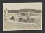 Children bathing in hot spring?, a woman watches in background, New Zealand?