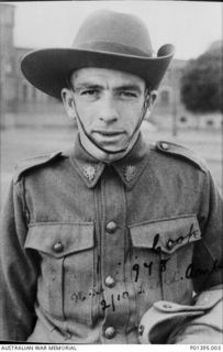 C1940. NX56978 PRIVATE W COOK, 2/10 FIELD AMBULANCE. PRIVATE COOK WAS A MEMBER OF THE FORCE DEFENDING NEW BRITAIN IN 1942. AFTER THE JAPANESE ATTACK HAD FORCED THE GARRISON TO WITHDRAW FROM RABAUL ..