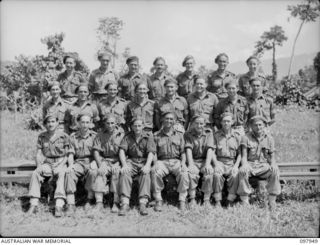 Torokina, Bougainville. 1945-10-12. Group portrait the Signal Section Personnel of 2nd Field Regiment. Left to right, back row: V35091 Signalman (Sig) H. C. Cochrane of Melbourne, Vic; VX109490 Sig ..