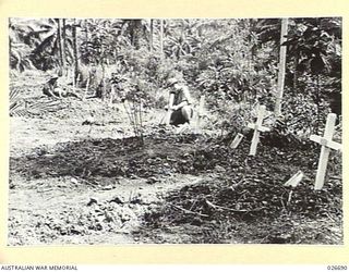 MILNE BAY, PAPUA. 1942-09. A SMALL CEMETERY NEAR GILI GILI WHERE AUSTRALIANS WHO FELL DURING THE FIGHTING AROUND THE SHORES OF MILNE BAY ARE BURIED