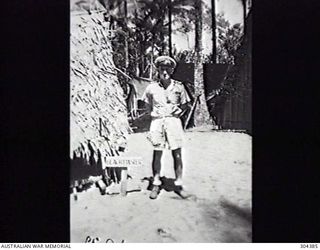 ORO BAY, NEW GUINEA. 1943. NAVY OFFICE STAFF. LIEUTENANT ADAMSON, THE BEACHMASTER. (NAVAL HISTORICAL COLLECTION)