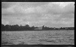 Houses viewed from sea at Baimuru (Vaimuru) village, Gulf Province