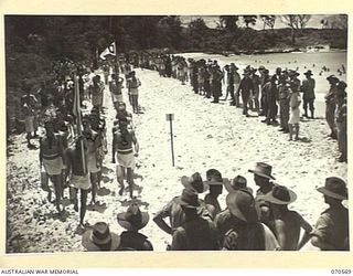 KELANOA, NEW GUINEA, 1944-02-20. 5TH DIVISION SIGNALS, THE WINNING TEAM, LEADING THE GRAND MARCHPAST AT A BEACH CARNIVAL ORGANISED BY CAPTAIN A.E. RICHARDS, AND SERGEANT P.J. HORAN OF THE ..