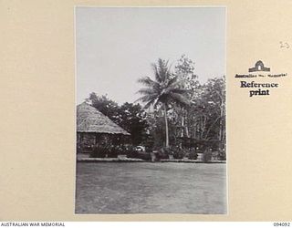 SOPUTA, NEW GUINEA, 1945-06-26. THE CAR PARK AT THE SOPUTA WAR CEMETERY, WHICH IS MAINTAINED BY THE AUSTRALIAN WAR GRAVES SERVICE. THIS IS THE SITE OF THE FIRST CEMETERY AT SOPUTA; IT WAS MOVED ..