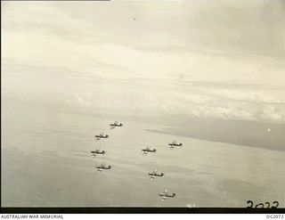 IN FLIGHT OVER BOUGAINVILLE ISLAND, SOLOMON ISLANDS. 1945-01-17. PHOTOGRAPH TAKEN FROM A WIRRAWAY AIRCRAFT OF NO. 5 (ARMY CO-OPERATION) SQUADRON RAAF WHICH ALSO ACT AS PATHFINDERS TO ROYAL NEW ..