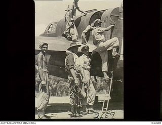 TADJI, NORTH EAST NEW GUINEA. C. 1945-06. THE CREW OF A BEAUFORT BOMBER AIRCRAFT OF NO. 100 SQUADRON RAAF WHICH LED THE BEAUFORT AIRCRAFT FORMATION ON DEATH DEALING STRIKES AGAINST JAPANESE ..