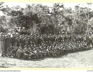 KILIGIA, NEW GUINEA. 1944-03-16. MEMBERS OF A SQUADRON, 1ST TANK BATTALION, 5TH DIVISION, WITH MATILDA TANKS AT THE BACKGROUND