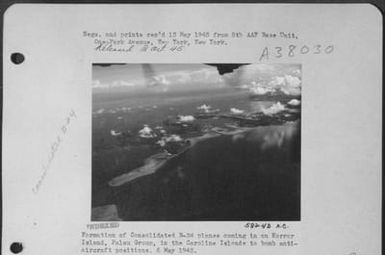 Formation Of Consolidated B-24 Planes Coming In On Korror Island Palau Group, In The Caroline Islands To Bomb Anti-Aircraft Positions. 6 May 1945. (U.S. Air Force Number 58243AC)