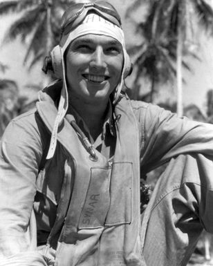 World War II (WWII) area photograph of US Marine Corps (USMC) First Lieutenant (1LT) Stanley T. Synar, taken at Russell Islands, July 19, 1943. 1LT Synar is an ace pilot and is credited with 5 kills. His hometown is Warner, Oklahoma