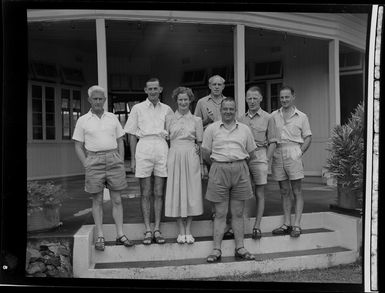 Group of unidentified men and woman at the entrance to Northern Hotels, Tavua, Fiji
