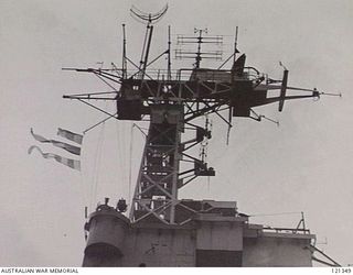 SYDNEY HARBOUR, NSW 1945-12-05. THE BRIDGE OF THE ROYAL NAVY AIRCRAFT CARRIER WHICH CARRIED 350 AUSTRALIAN LONG SERVICE PERSONNEL BACK FROM WEWAK TO AUSTRALIA. (PHOTOGRAPHER L/CPL E. MCQUILLAN)