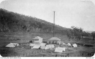 PORT MORESBY, NEW GUINEA. 1914-08. INSCRIPTION ON VERSO: "VIEW OF RADIO STATION, PORT MORESBY, AUG 1914 SHOWING ENTRENCHMENTS AND A.C. (ARMED CONSTABULARY?) CAMP". (ORIGINAL PRINT HELD IN AWM ..