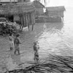 Matthew Hooper out fishing with friends. Sea latrine in background