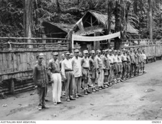 KUMUIA YAMA, RABAUL AREA, NEW BRITAIN. 1945-09-17. A CHINESE PLATOON, PART OF A COMPLETE UNIT BROUGHT FROM SINGAPORE BY THE JAPANESE TO WORK IN NEW BRITAIN DURING THE JAPANESE OCCUPATION. THEY ARE ..