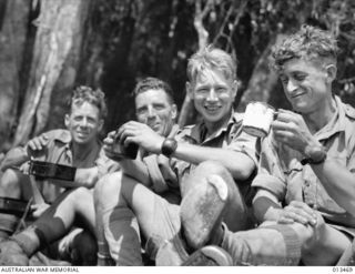 Men of the 2/16th Battalion now in action on the New Guinea front. These men, who have previously seen service in the Western Desert and Syria, identified left to right are:- WX14749 Private (Pte) ..