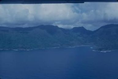 [Aerial view of mountains and coastline in American Samoa] BRIT-A-AR003-004-01-025