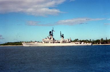 A port beam view of the guided missile cruiser USS WILLIAM H. STANDLEY (CG-32) as it departs from the harbor