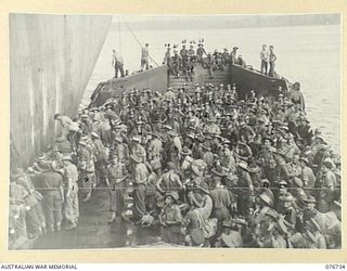 Bougainville Island, Solomons. 3rd Division Headquarters and attached troops aboard an American Landing Craft Infantry (LCI) waiting to be transported to the beach.
1. WX33905 Captain (Capt) Robert ..